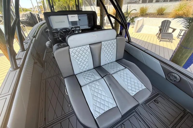 Yacht Photos Pics Luxurious seating on 2020 Statement 350 Open boat with quilted upholstery and modern dashboard.
