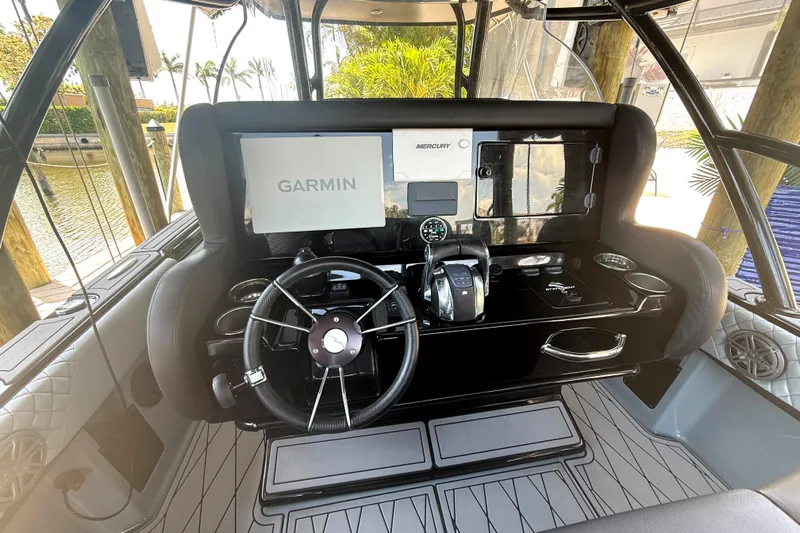  Yacht Photos Pics Cockpit of 2020 Statement 350 Open boat with Garmin navigation system.