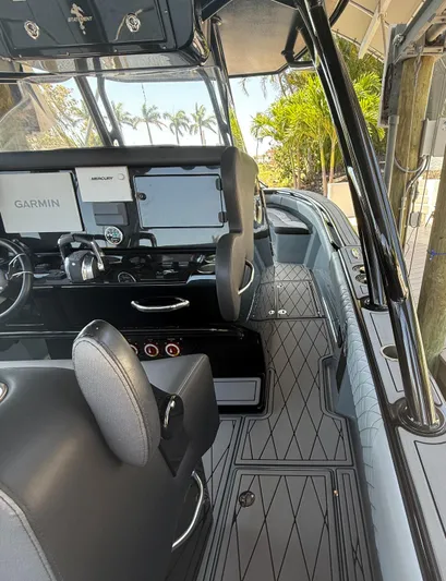  Yacht Photos Pics 2020 Statement 350 Open boat interior with modern dashboard and seating.