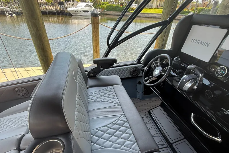  Yacht Photos Pics Interior of 2020 Statement 350 Open boat with Garmin navigation system.