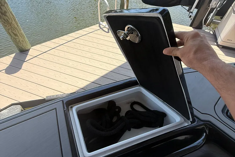  Yacht Photos Pics Open storage compartment on a 2020 Statement 350 Open boat, dockside view.