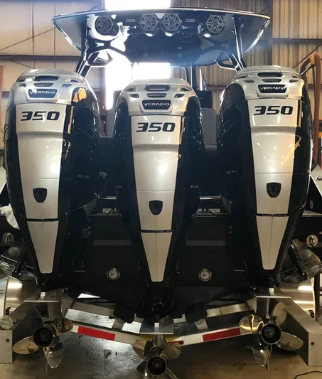  Yacht Photos Pics Triple Volvo 350 engines on a 2020 Statement 350 Open boat in a warehouse.