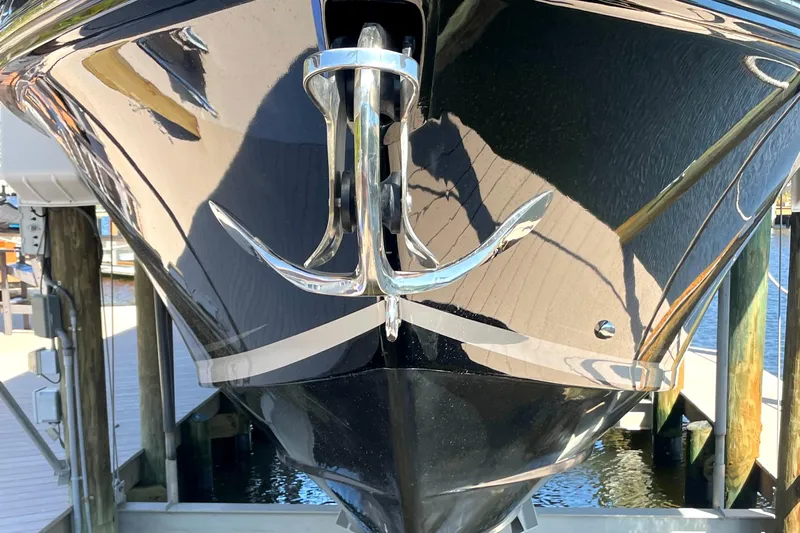  Yacht Photos Pics Bow of a 2020 Statement 350 Open boat with a shiny anchor.