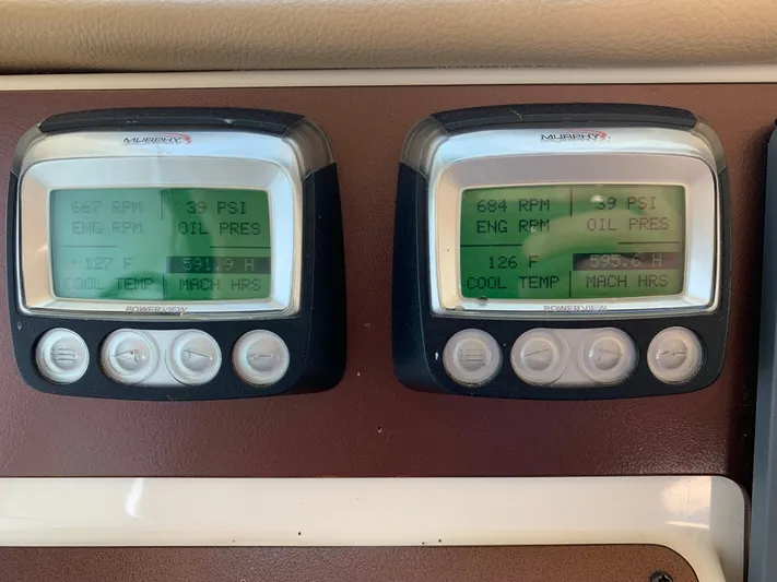 Live Now Yacht Photos Pics Digital engine displays on a 2012 Silverton 33 Sport Coupe showing RPM, oil pressure, and temperature.