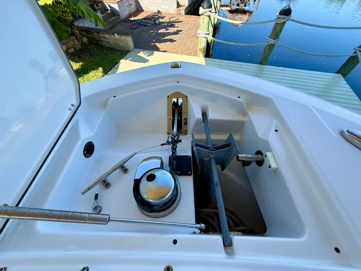  Yacht Photos Pics 2019 Blackfin 272 DC boat anchor compartment with winch, dockside view.