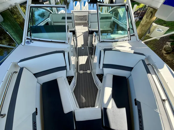  Yacht Photos Pics 2019 Blackfin 272 DC boat interior with spacious seating and sleek design.