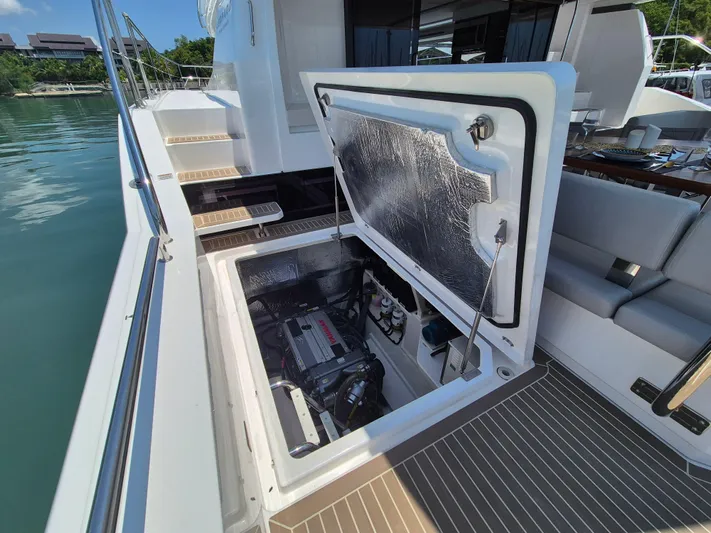  Yacht Photos Pics 2024 Leopard 53 Powercat engine compartment open on deck, showcasing interior components.