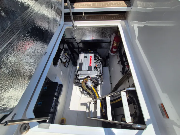  Yacht Photos Pics Engine compartment of 2024 Leopard 53 Powercat with visible Yanmar engine and safety equipment.