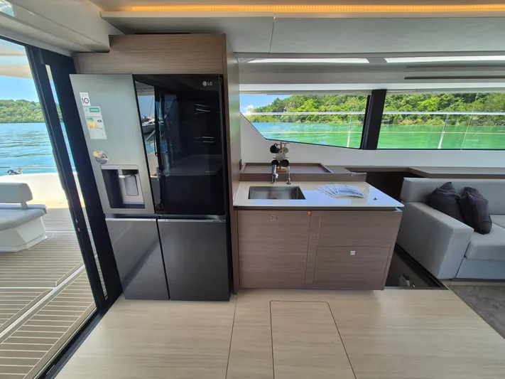  Yacht Photos Pics Modern kitchen interior of 2024 Leopard 53 Powercat yacht with sleek design and scenic view.