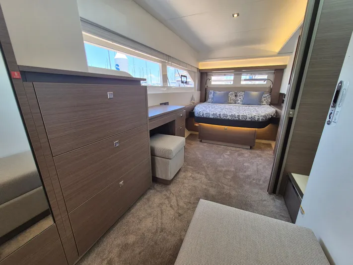  Yacht Photos Pics Luxurious interior of 2024 Leopard 53 Powercat with elegant bedroom and modern furnishings.