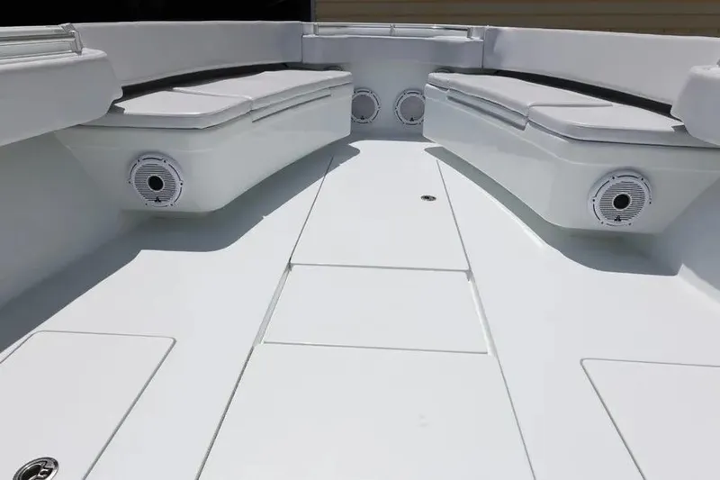  Yacht Photos Pics 2025 Contender 39 ST boat interior with cushioned seating and built-in speakers.