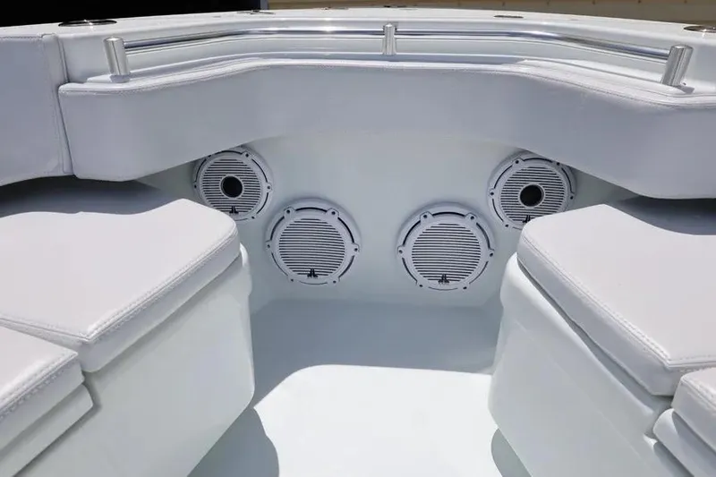  Yacht Photos Pics Interior of 2025 Contender 39 ST boat with cushioned seating and built-in speakers.