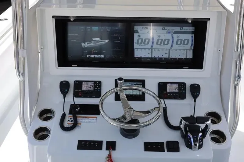  Yacht Photos Pics 2025 Contender 39 ST boat dashboard with advanced navigation and control systems.