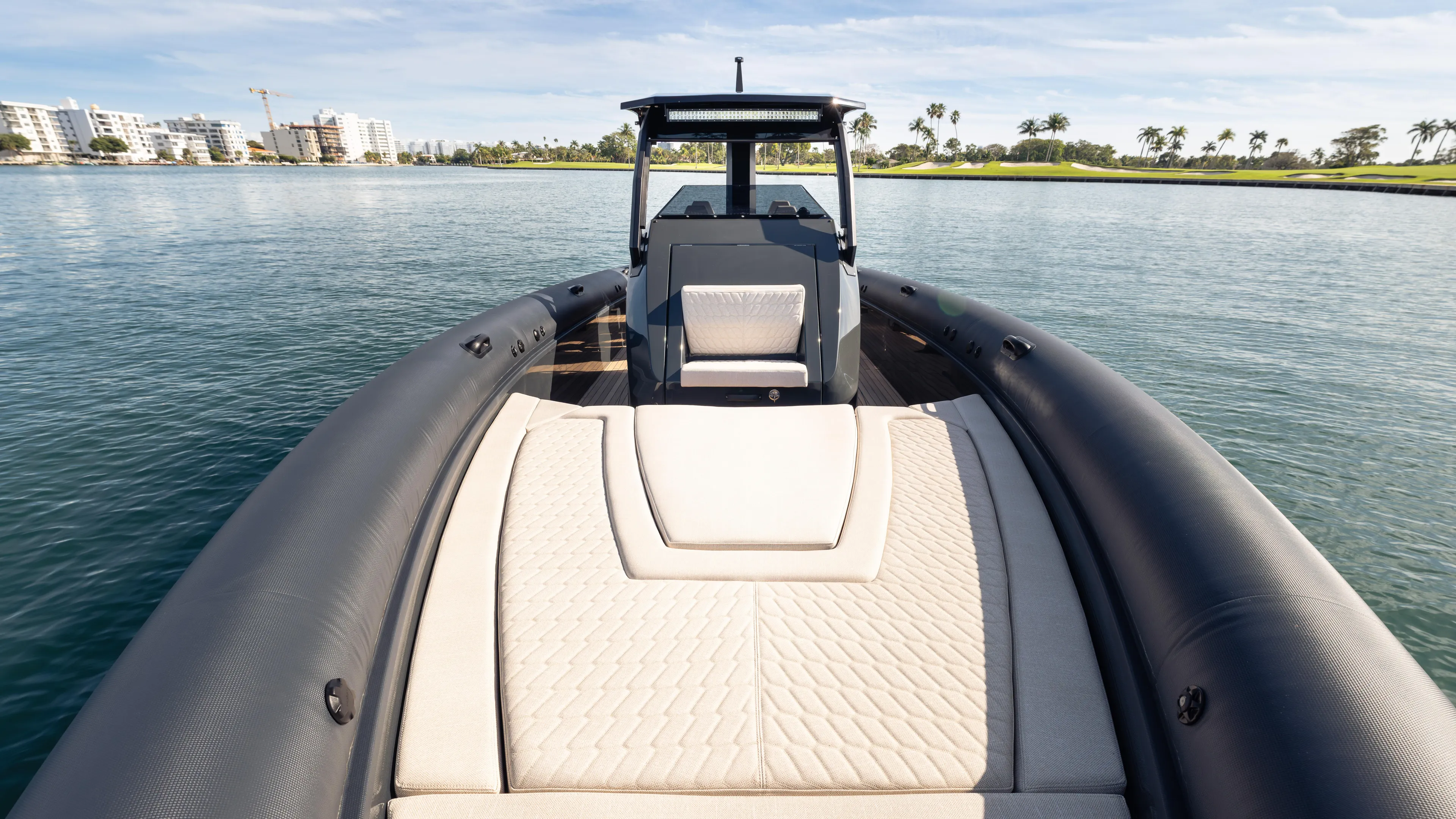 New 2025 Skipper 38 Twin 500 Yacht Photos Pics 2025 Skipper-BSK 38 boat on calm water, featuring sleek design and luxurious seating.