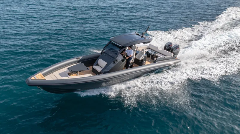 New 2025 Skipper 38 Twin 500 Yacht Photos Pics 2025 Skipper-BSK 38 boat cruising on open water, showcasing sleek design and powerful performance.