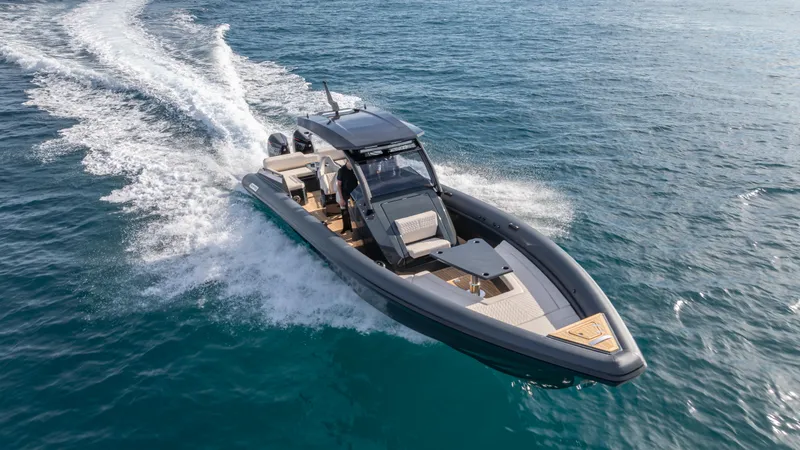 New 2025 Skipper 38 Twin 500 Yacht Photos Pics 2025 Skipper-BSK 38 boat cruising on open water, showcasing sleek design and powerful performance.