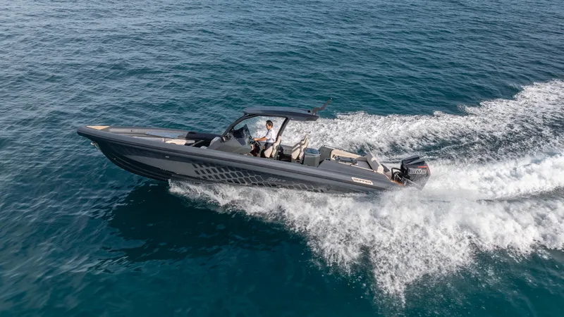 New 2025 Skipper 38 Twin 500 Yacht Photos Pics 2025 Skipper-BSK 38 boat cruising on open water, showcasing sleek design and powerful performance.