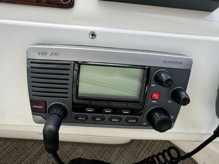 Messing About Yacht Photos Pics Garmin VHF 200 radio on 2003 Sea Ray 400 Sedan Bridge yacht.