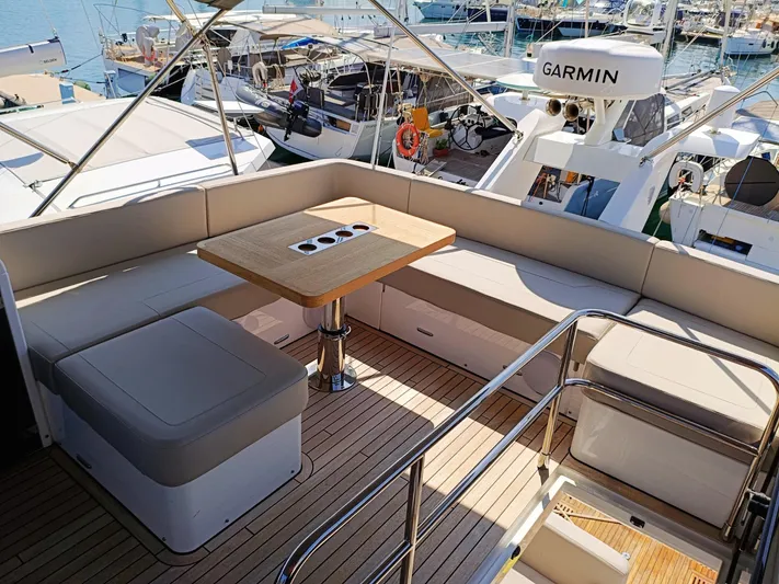  Yacht Photos Pics Luxurious 2025 Fairline Squadron 50 yacht with spacious seating and Garmin navigation system.