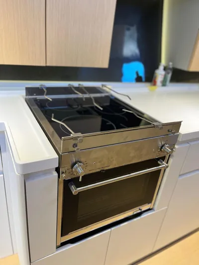  Yacht Photos Pics Modern kitchen stove in a Vismara V78 yacht, 2004 model.