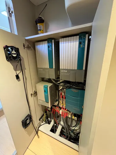  Yacht Photos Pics Electrical system inside a 2004 Vismara V78 yacht, featuring inverters and wiring.