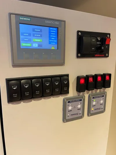  Yacht Photos Pics Control panel with Siemens display and switches on a 2004 Vismara V78 yacht.