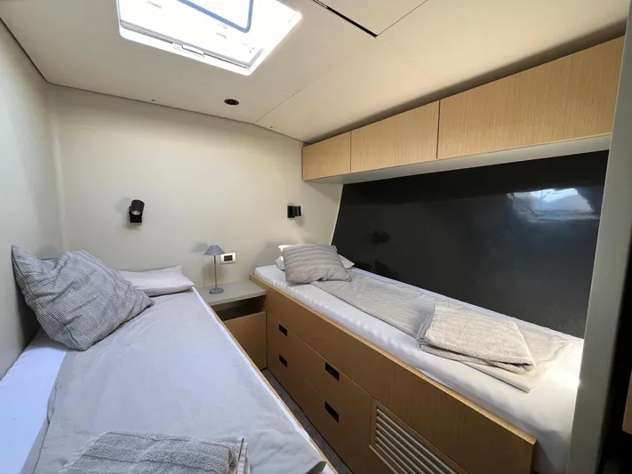  Yacht Photos Pics Cabin interior of 2004 Vismara V78 yacht with twin beds and modern design.