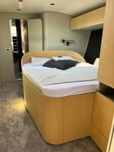  Yacht Photos Pics Luxurious interior of 2004 Vismara V78 yacht featuring a modern bedroom design.