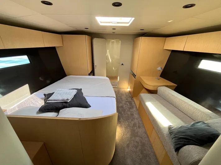  Yacht Photos Pics Luxurious Vismara V78 yacht interior, featuring a spacious bedroom with modern furnishings, 2004 model.