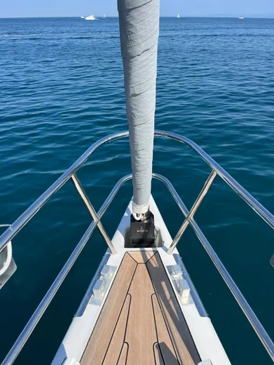  Yacht Photos Pics Bow of 2004 Vismara V78 yacht on calm blue sea.