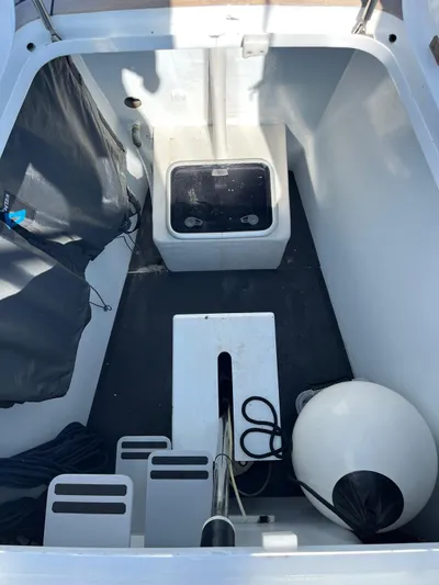  Yacht Photos Pics 2004 Vismara V78 yacht interior with storage and equipment.