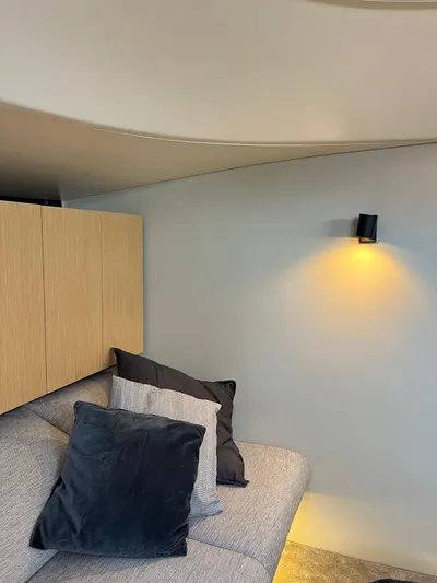  Yacht Photos Pics Interior of 2004 Vismara V78 yacht with cozy seating and modern lighting.