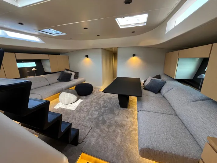  Yacht Photos Pics Luxurious interior of 2004 Vismara V78 yacht with modern seating and ambient lighting.