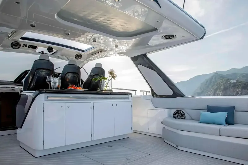 Extra II Yacht Photos Pics Luxurious 2025 Azimut Verve 48 yacht interior with sleek seating and modern design.