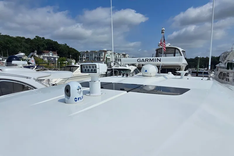 Princess Gia Yacht Photos Pics 2021 Tiara Sport 43 LS yacht with advanced navigation equipment docked at marina.