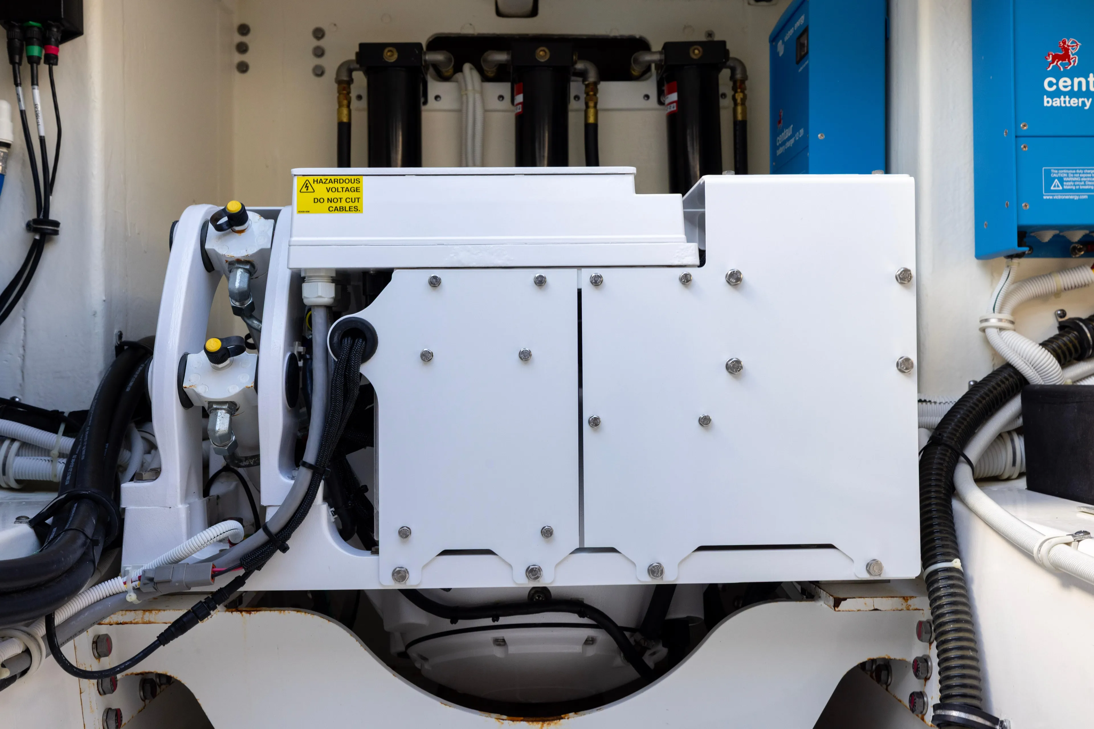 Princess Gia Yacht Photos Pics Engine compartment of 2021 Tiara Yachts 43 LS, featuring electrical components and wiring.