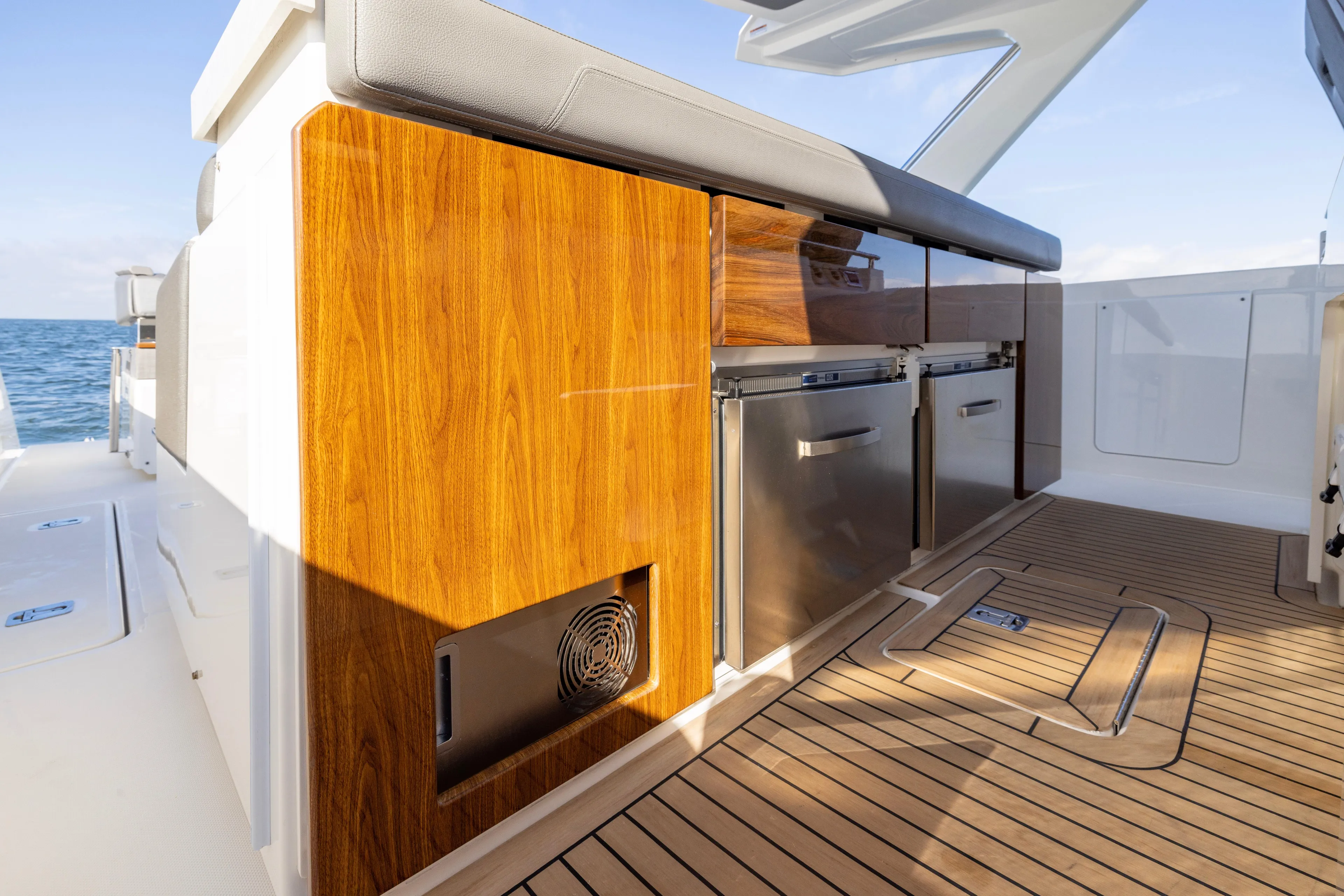 Princess Gia Yacht Photos Pics 2021 Tiara Yachts 43 LS interior with sleek wood cabinetry and stainless steel appliances.