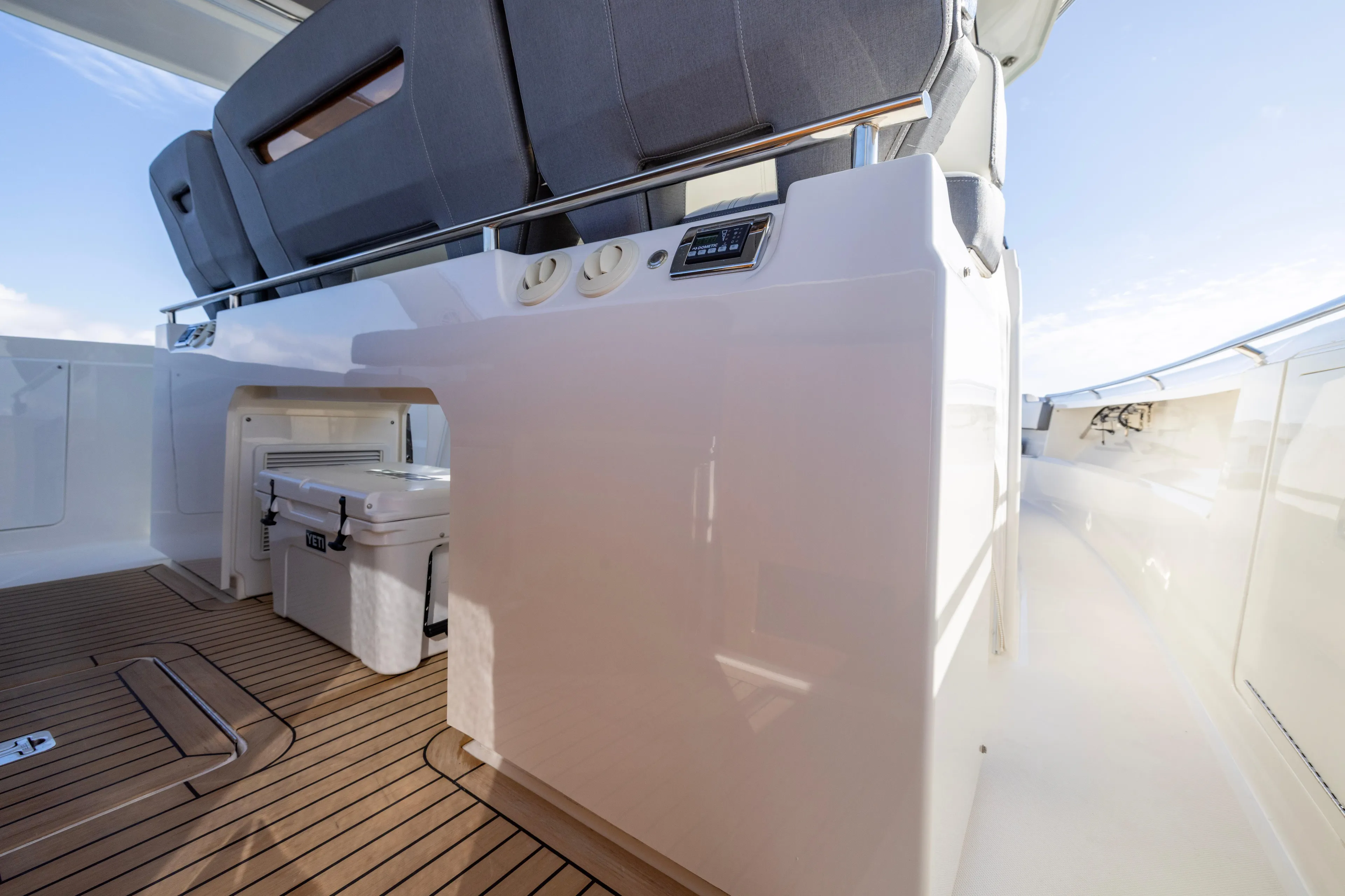 Princess Gia Yacht Photos Pics 2021 Tiara Yachts 43 LS interior with seating and storage area.