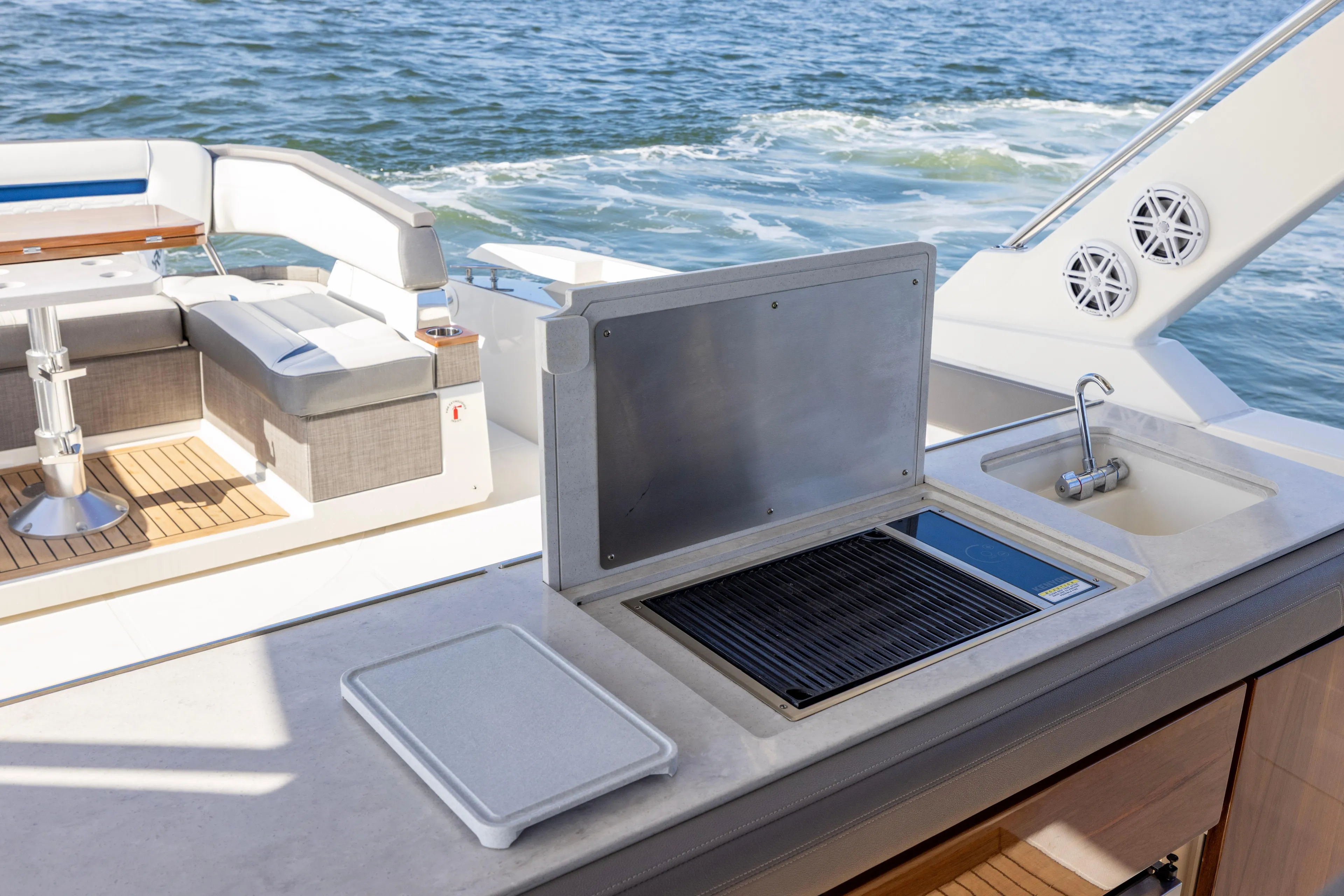 Princess Gia Yacht Photos Pics 2021 Tiara Yachts 43 LS yacht deck with grill and seating area.