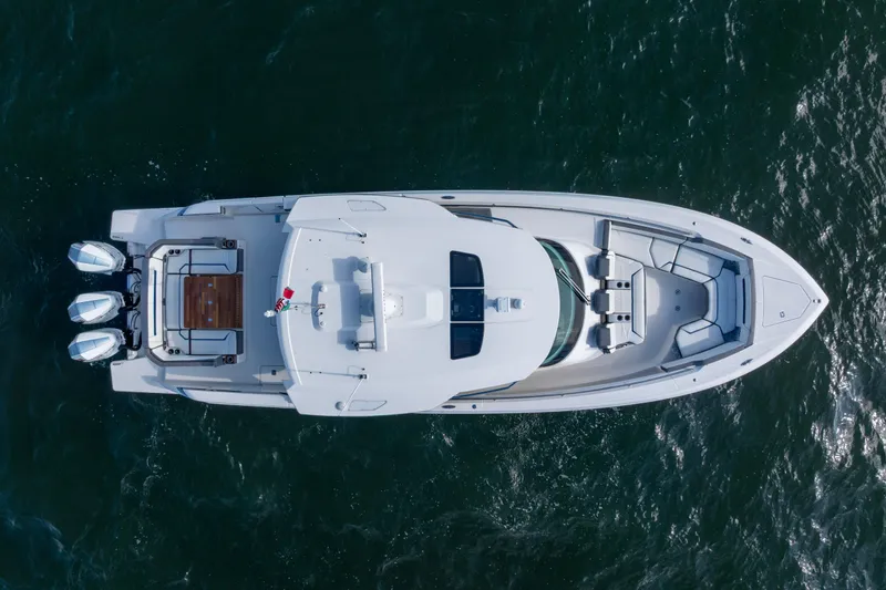 Princess Gia Yacht Photos Pics Aerial view of 2021 Tiara Yachts 43 LS on open water.