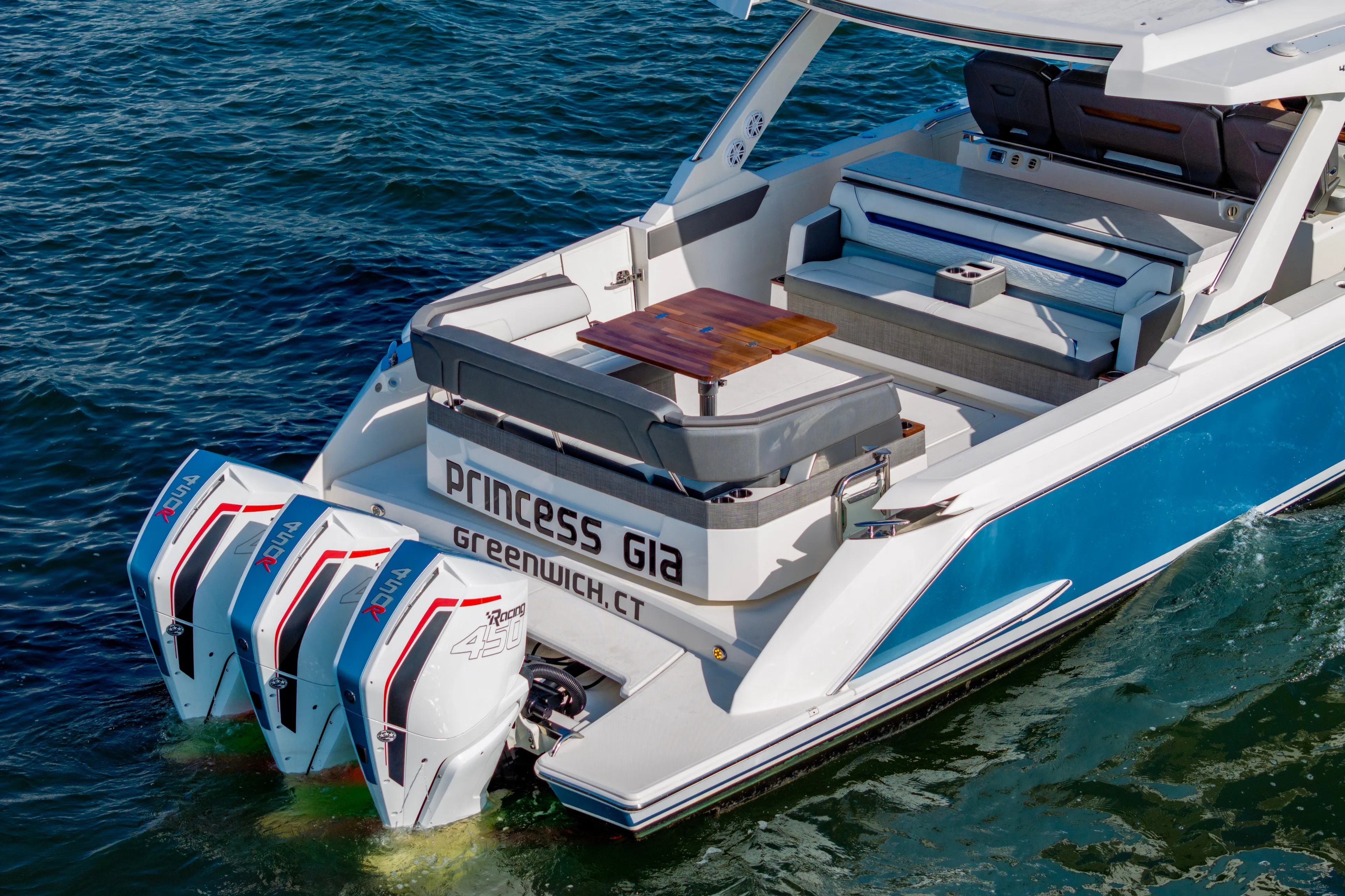 Princess Gia Yacht Photos Pics 2021 Tiara Yachts 43 LS with triple outboard engines on the water.