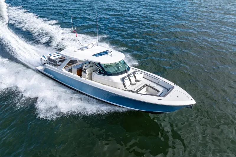 Princess Gia Yacht Photos Pics 2021 Tiara Yachts 43 LS cruising on open water, showcasing sleek design and performance.