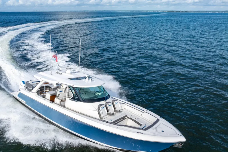 Princess Gia Yacht Photos Pics 2021 Tiara Yachts 43 LS cruising on open water, showcasing sleek design and luxury features.