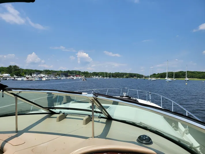 Phantom Yacht Photos Pics View from a 2000 Sea Ray 460 Sundancer yacht overlooking a serene marina.