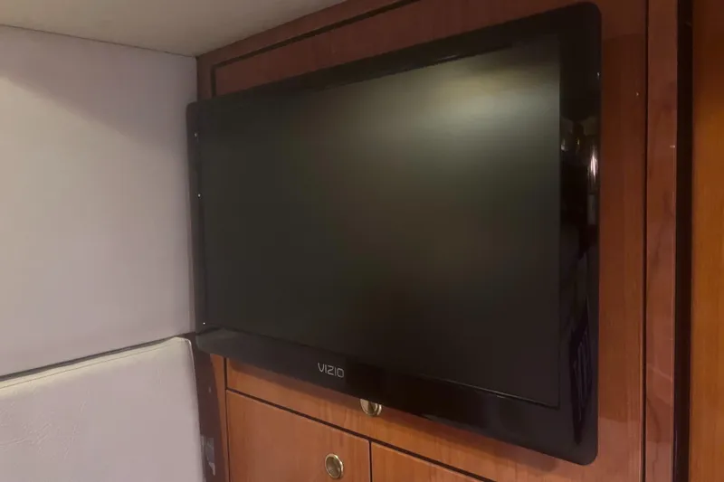 Phantom Yacht Photos Pics Flat-screen TV mounted in 2000 Sea Ray 460 Sundancer cabin.