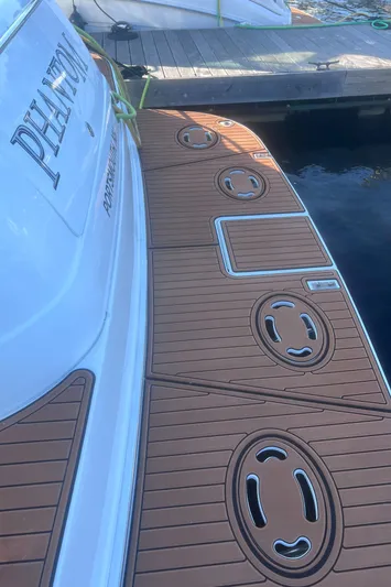 Phantom Yacht Photos Pics 2000 Sea Ray 460 Sundancer yacht with teak deck at marina.