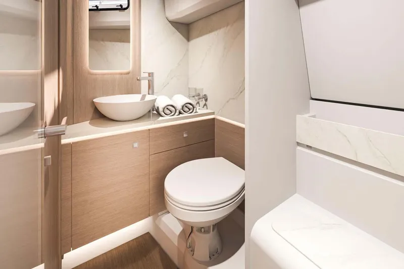  Yacht Photos Pics Manufacturer Provided Image: Luxurious bathroom in 2025 Beneteau Gran Turismo 35 yacht, featuring modern fixtures and elegant design.