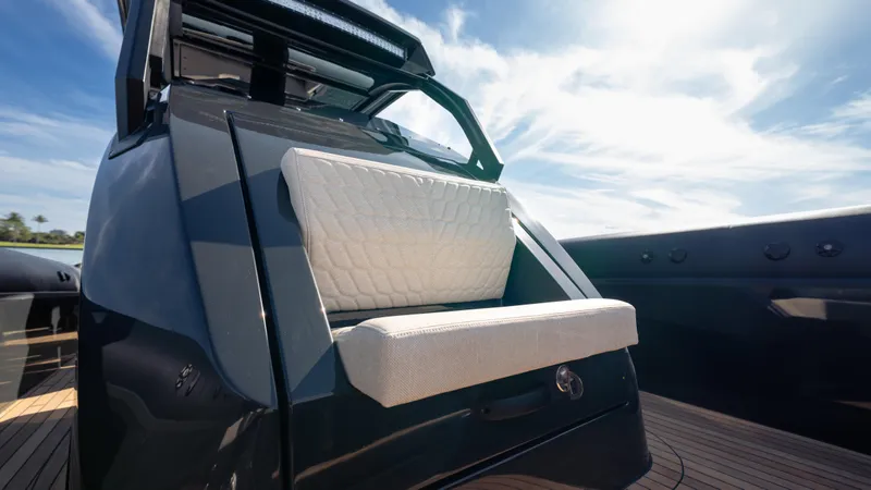 New 2025 Skipper 38 Twin 500 Yacht Photos Pics 2025 Skipper 38 boat with sleek design and cushioned seating under a clear blue sky.