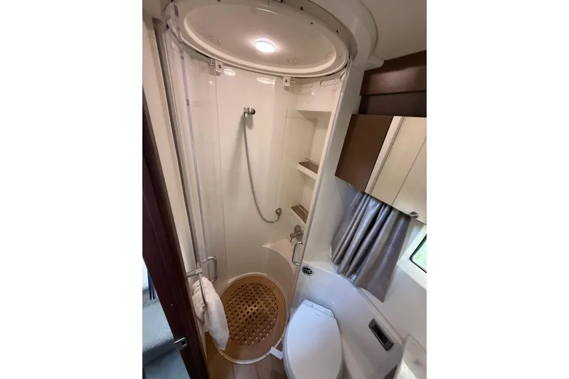 Tea Time III Yacht Photos Pics Compact bathroom in 2018 Sea Ray Fly 400 yacht with shower and toilet.
