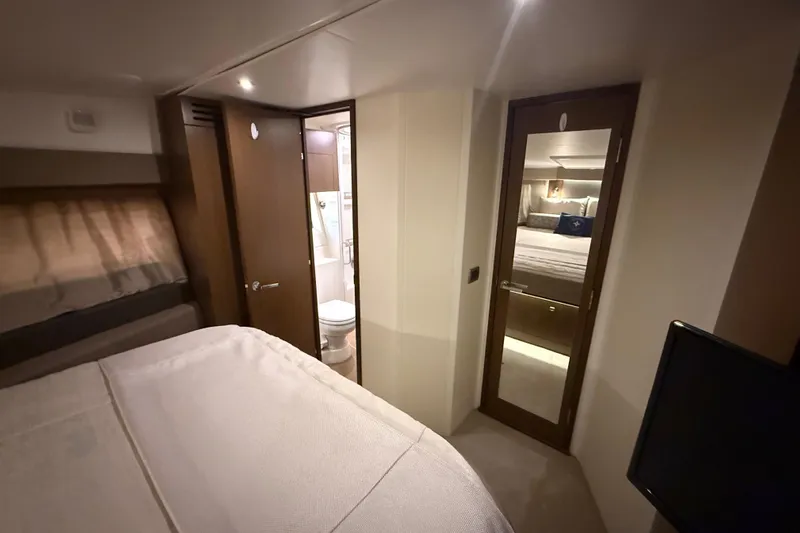 Tea Time III Yacht Photos Pics Luxurious interior of 2018 Sea Ray Fly 400 yacht cabin with modern amenities.